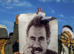 A Kurdish militant group decides to disband and disarm as part of a peace initiative with Turkey