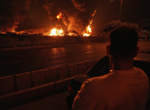 Israel’s defense minister warns ‘Tehran will burn’ if Iran continues firing missiles