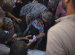 Strikes kill 94 Palestinians in Gaza, including 45 people waiting for aid, authorities say