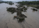 At least 13 dead in Texas floods and more than 20 children missing from a girls summer camp