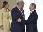 Summit puts Putin back on the global stage and Trump echoes a Kremlin position