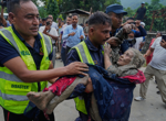 Floods caused by a glacial collapse kill at least 160 people on Nepal-China border, hundreds missing