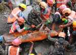 2 trapped workers pulled out alive from a tunnel 9 days after floods hit Nepal