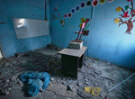 Iranian school turned to rubble by a US strike draws families to grieve children