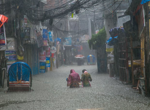 ‘We have lost everything’: extreme rainfall across Asia brings flash floods and typhoons