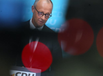 German chancellor vows to stay in office despite AfD triumph in state election