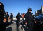 Police fire crowd dispersal projectiles at LA protesters