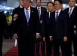 Trump arrives in China as Iran war looms over high-stakes visit with Xi