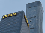 A small plane slammed into the tallest skyscraper in China’s capital. Hours later, it was like nothing had happened