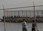 Spain says most of the 50,000 migrants who crossed into its territory have been returned