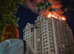 Russian missile and drone strikes kill two in Kyiv after Zelensky warns of massive attack