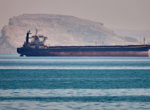 Ship hit in Hormuz as Iran's top negotiator says strait to stay shut