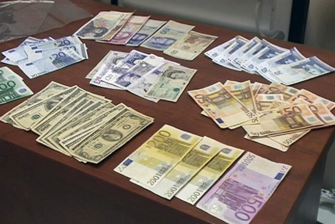 Престъпна група, занимавала се с изготвяне и разпространение на неистински документи за самоличност, е задържана от служители на ГДБОП